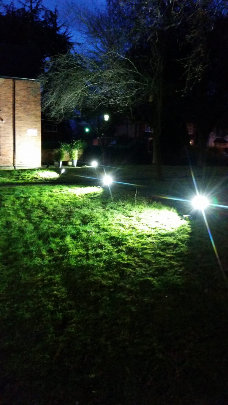 LED floodlights installed to enhance the appearance of a historic building during the evening.