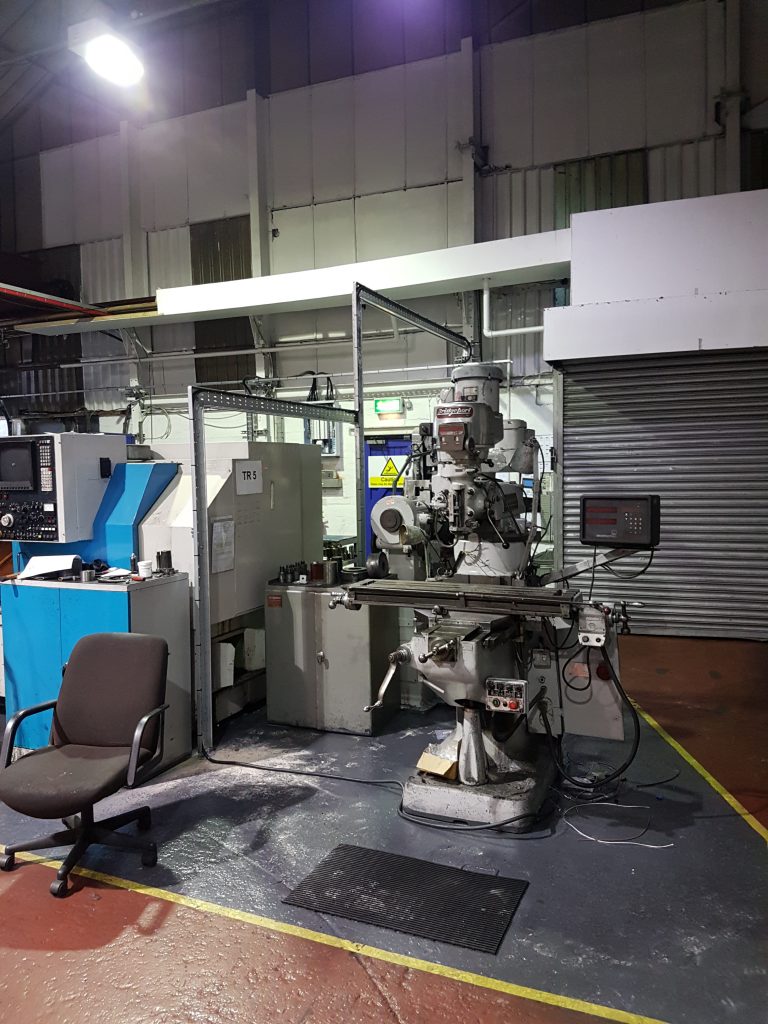 Relocated industrial machinery supplied by a new electrical installation in a Birmingham factory.