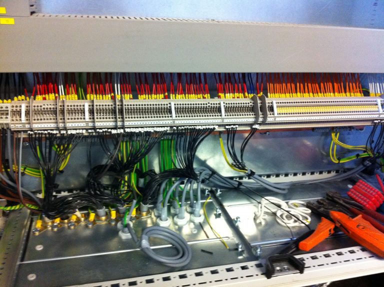 Commercial malt roasting oven control wiring completed inside an industrial electrical control panel during refurbishment.